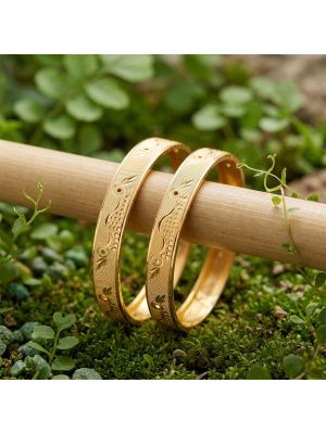 Avian Lasered Gold Bangles