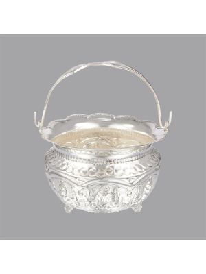Ornate silver pot with handle