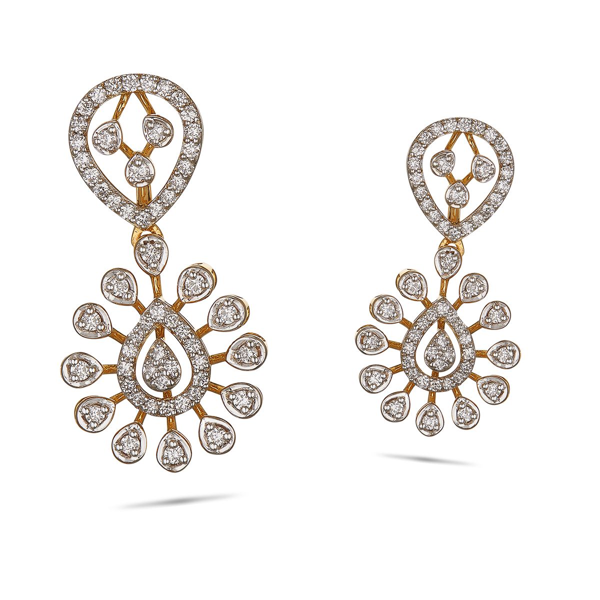 Yellow gold earrings set with diamonds in the classic 'nakshatra' design,  but with a special touch to make all th… | Earrings, Yellow gold earring, Diamond  earrings