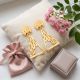 Floral Plume Triangular Gold Drop Earrings