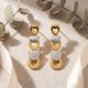 Sleek Dual Tone Gold Drop Earrings