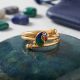 Regal Peacock Enamel Coiled Gold Ring