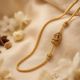 Sacred Lotus Shrine Lakshmi Mugappu Gold Chain