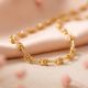 Classic Loop Knot Gold Chain